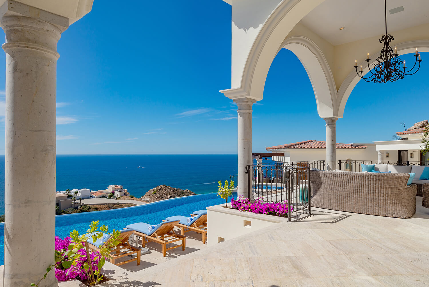 The terrace looking down to the pool and the beach below