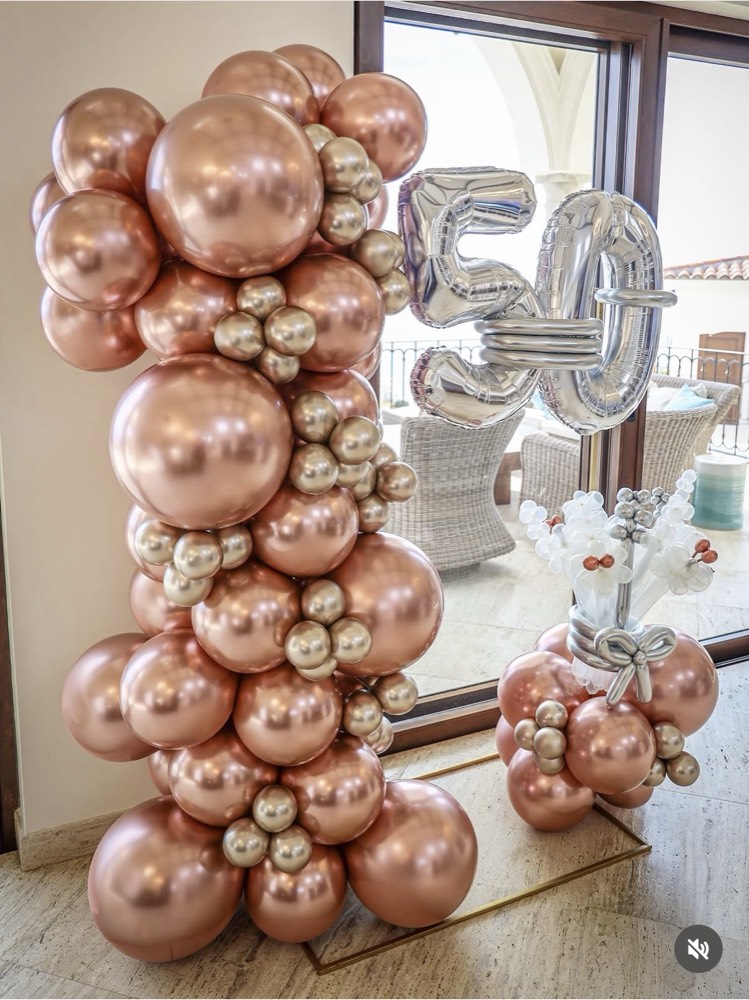 Balloons set up in the house for a fiftieth birthday